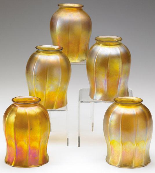 Appraisal: TIFFANY STUDIOS Five gold Favrile floriform glass shades Each marked