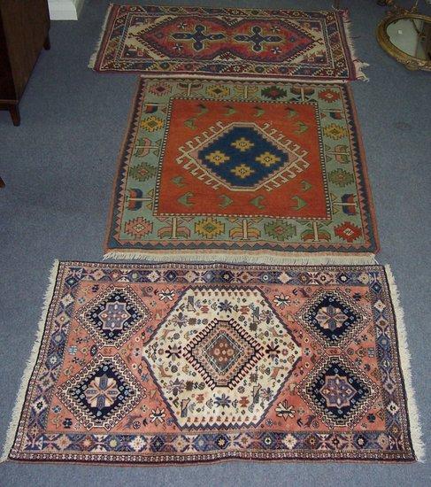 Appraisal: A th Century Caucasian rug with central blue medallion on