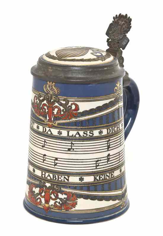 Appraisal: A German Pottery Stein Mettlach model -liter with etched musical