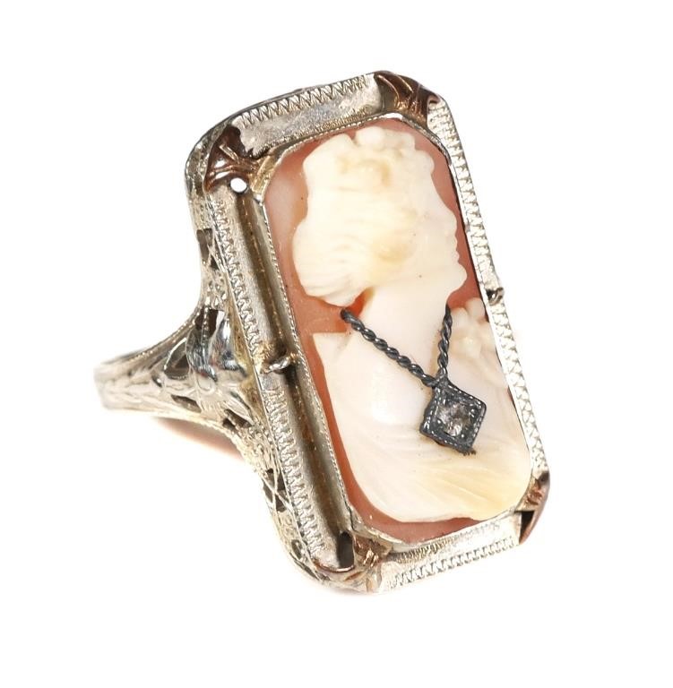 Appraisal: Old white gold filigree ring with shell cameo Weighs grams