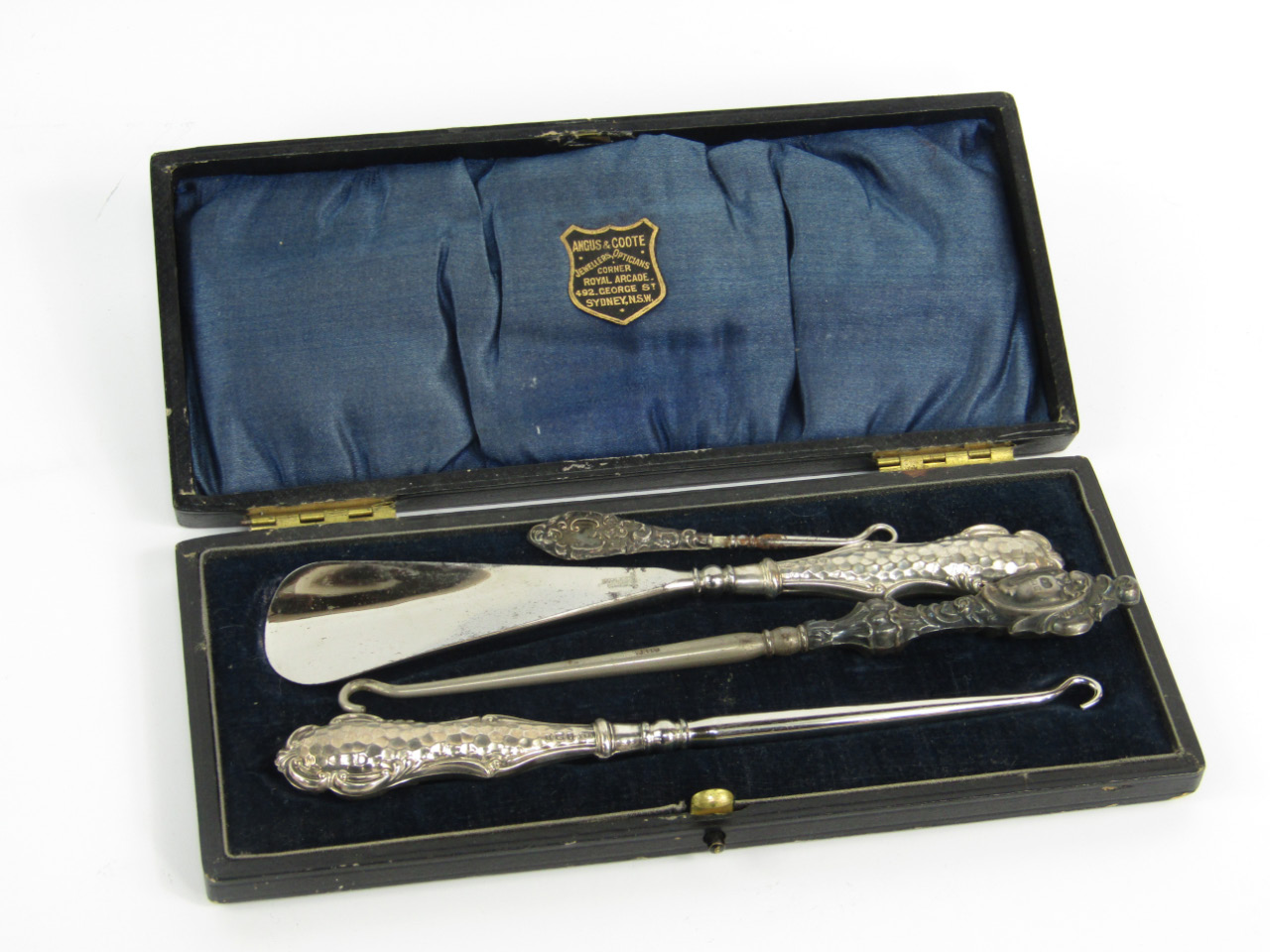 Appraisal: A George V silver handled button hook and shoe horn