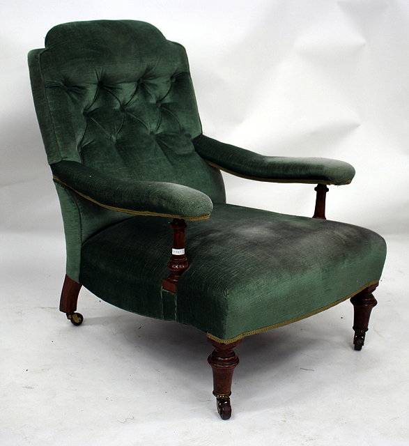 Appraisal: A VICTORIAN GREEN DRAYLON UPHOLSTERED BUTTON BACK ARMCHAIR with overstuffed