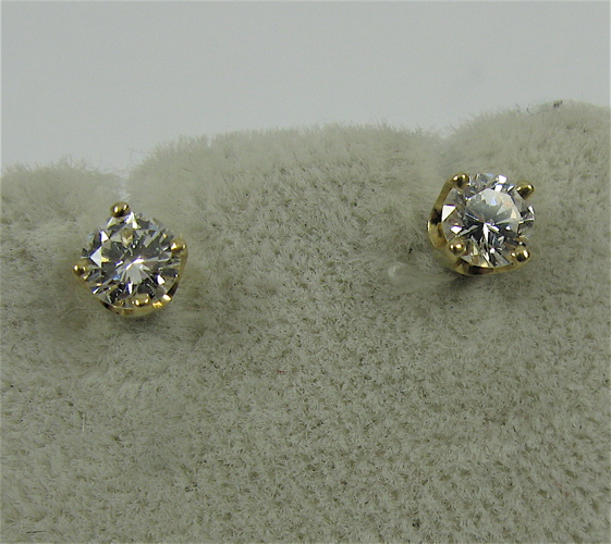 Appraisal: PAIR OF DIAMOND AND K GOLD EAR STUDS with appraisal