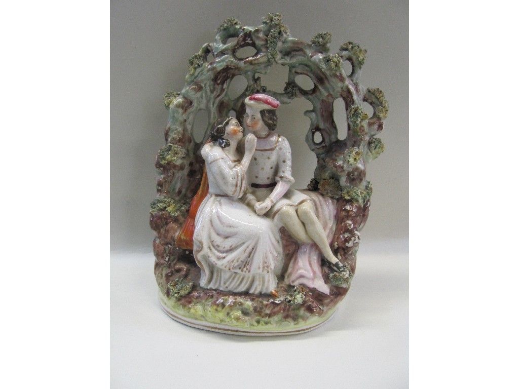 Appraisal: Staffordshire group of a couple under a foliate arch