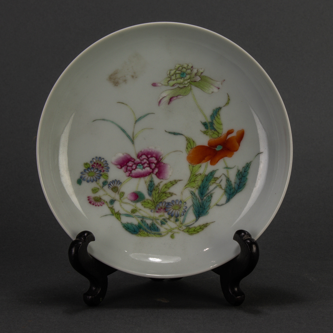 Appraisal: Chinese famille rose dish painted with various flowers to the