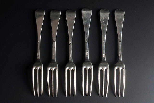 Appraisal: A SET OF SIX SILVER HANOVARIAN THREE PRONG DESSERT FORKS