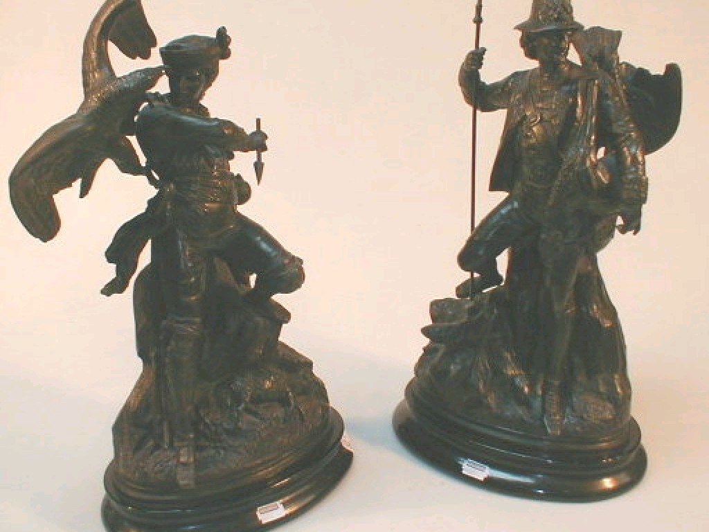 Appraisal: A pair of late thC Spelter figures of hunters one