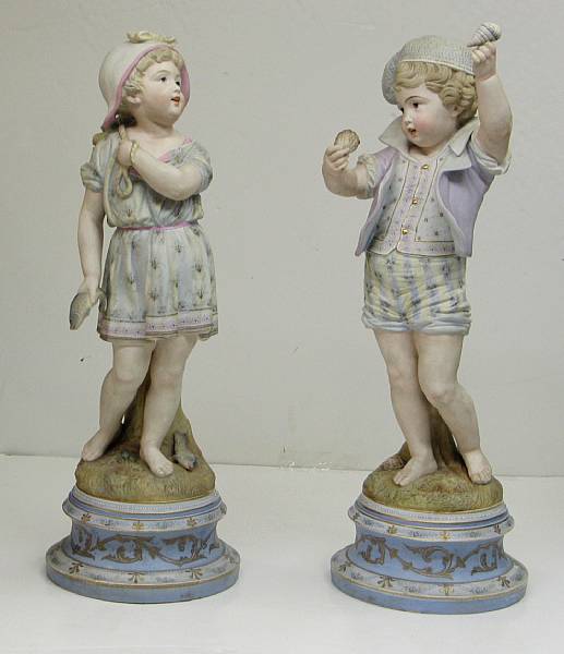 Appraisal: A pair of French colored bisque porcelain figures of children