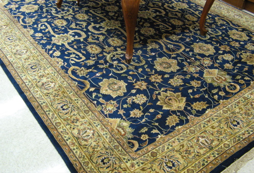 Appraisal: HAND KNOTTED ORIENTAL CARPET Indo-Persian overall scrolling floral raceme decoration