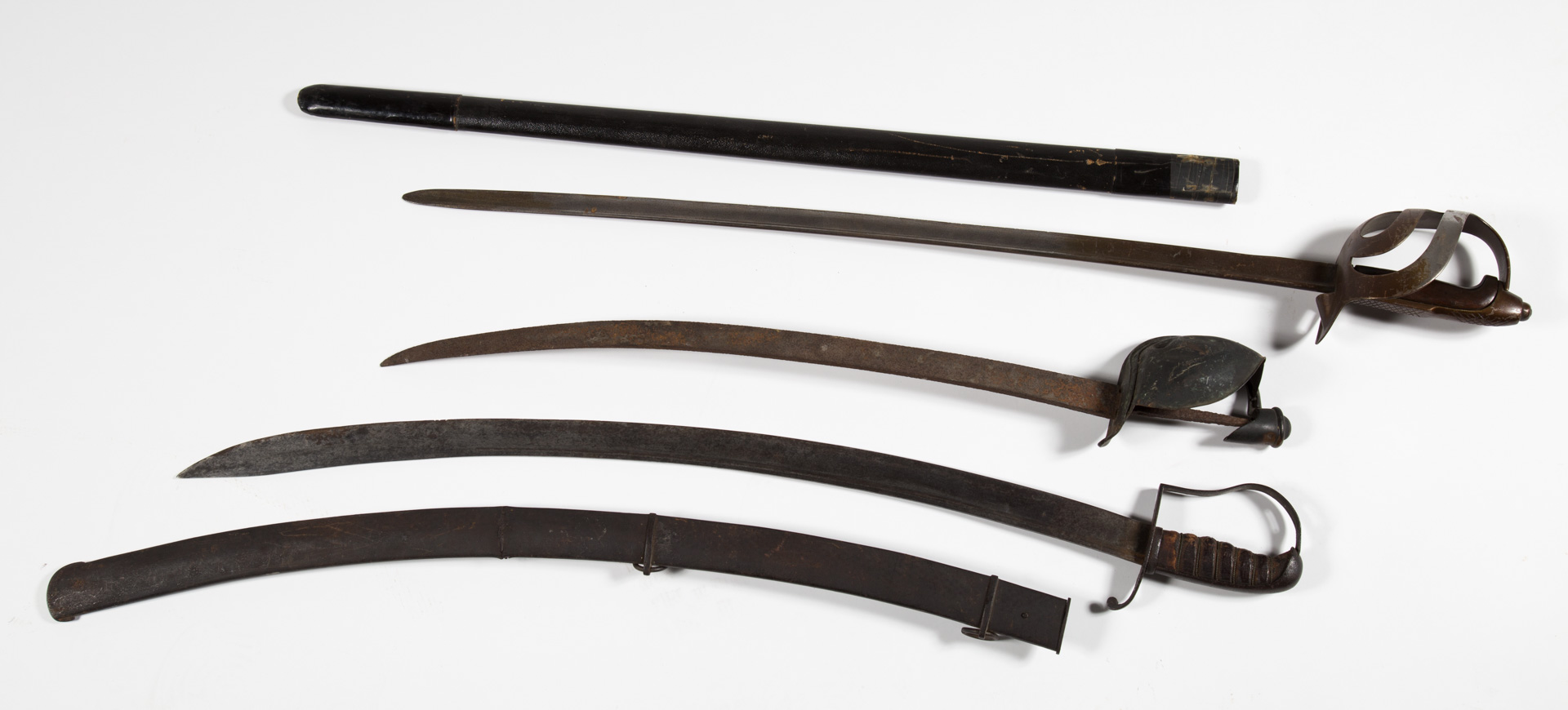 Appraisal: including one cutlass with metal scabbard blade overall fair condition