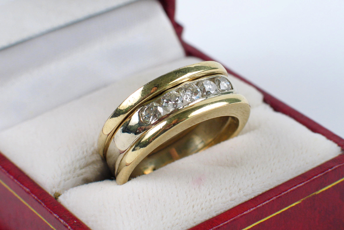 Appraisal: MAN'S DIAMOND AND FOURTEEN KARAT YELLOW AND WHITE GOLD RING