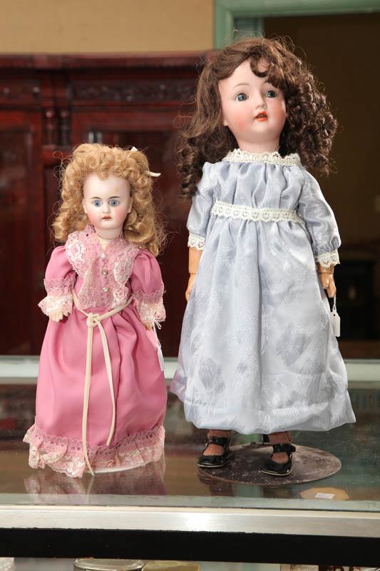 Appraisal: TWO BISQUE HEAD DOLLS One marked Revalo and having blue