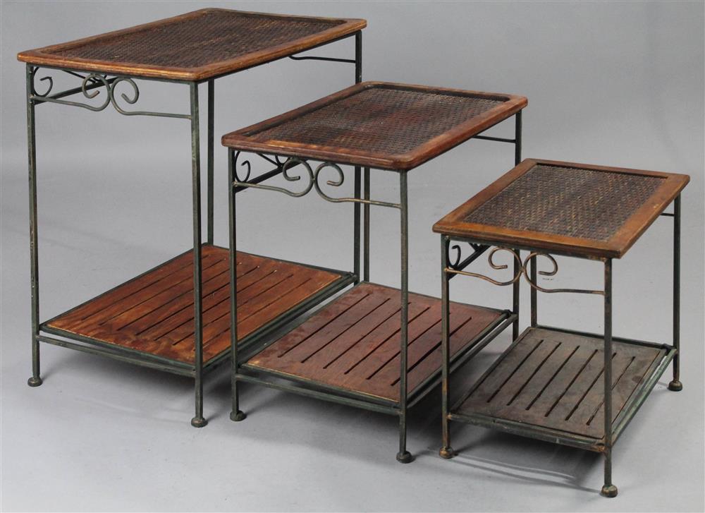 Appraisal: SET OF THREE WROUGHT IRON AND RATTAN NESTING TABLES ingenious