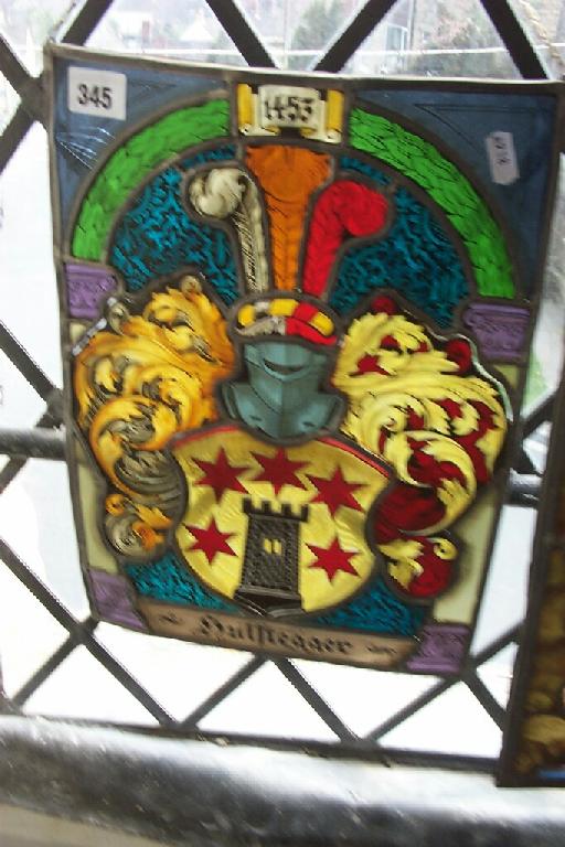 Appraisal: A th century coloured and leaded glass panel showing the