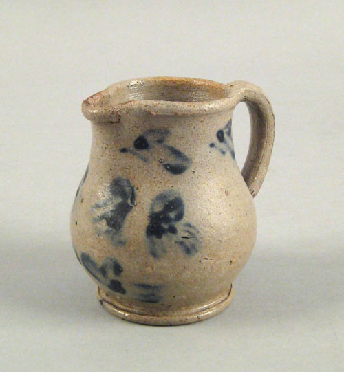 Appraisal: Pennsylvania stoneware creamer th c with cobalt floral decoration h