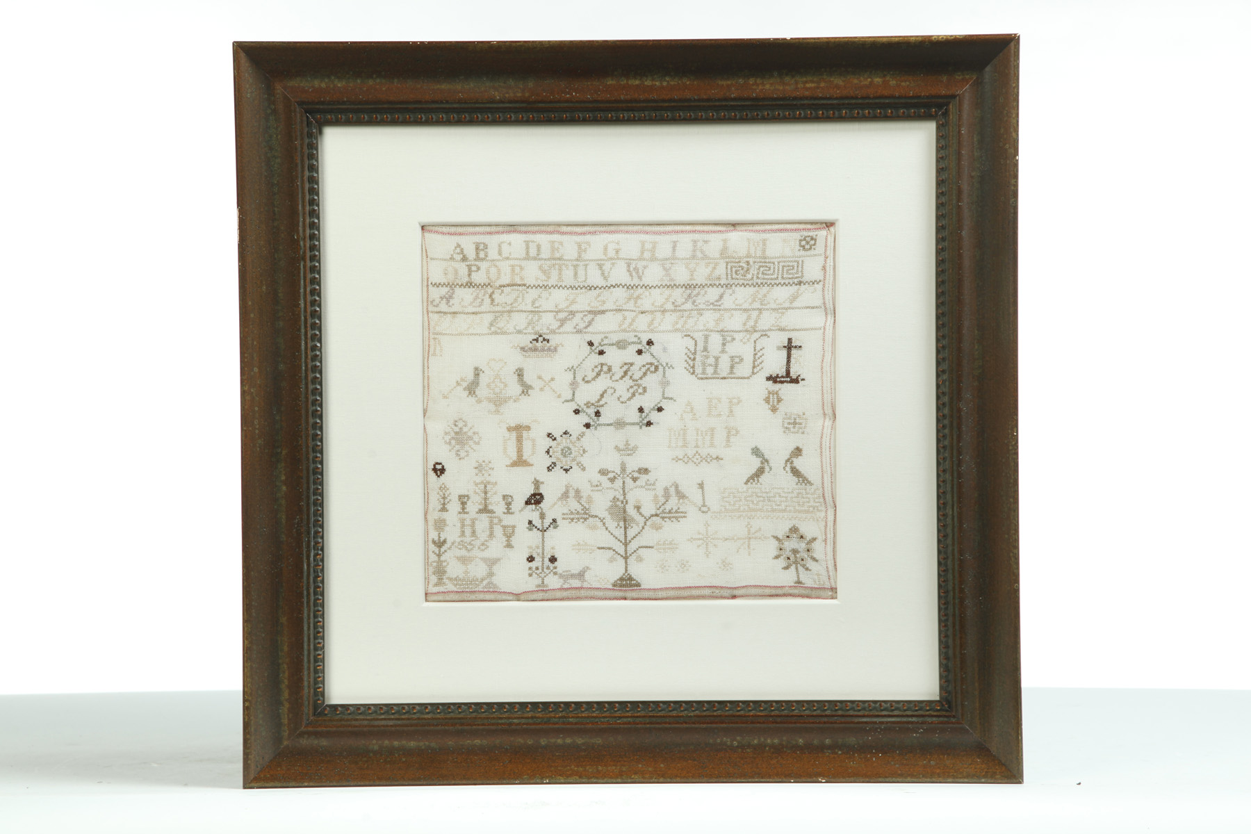 Appraisal: FRAMED SAMPLER England th century Wonderfully executed stitching in green