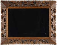 Appraisal: FINE CARVED WALNUT MIRROR First half of the th Century