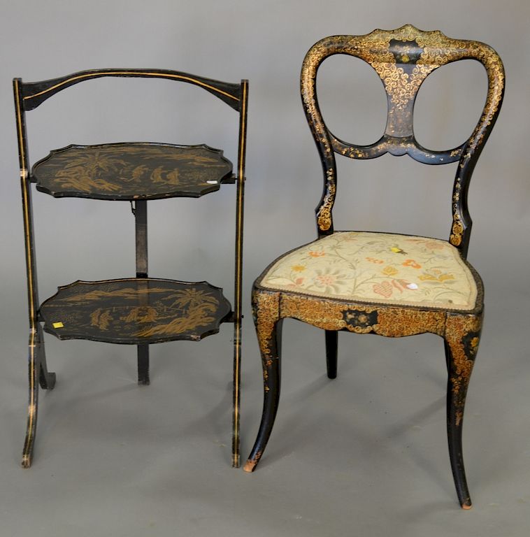 Appraisal: Victorian black gilt and polychrome decorated papier mache chair th