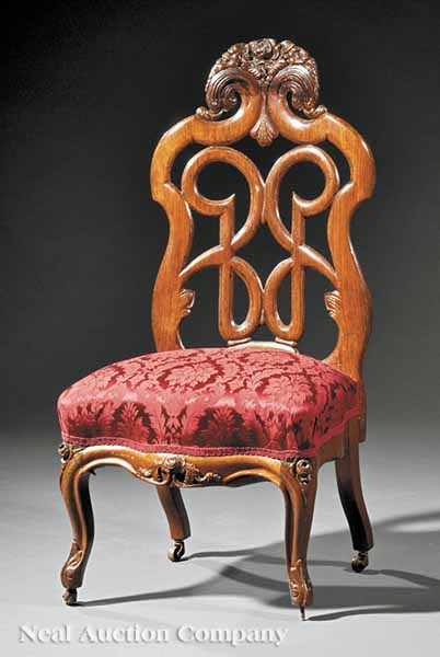 Appraisal: An American Rococo Carved and Laminated Rosewood Slipper Chair mid-