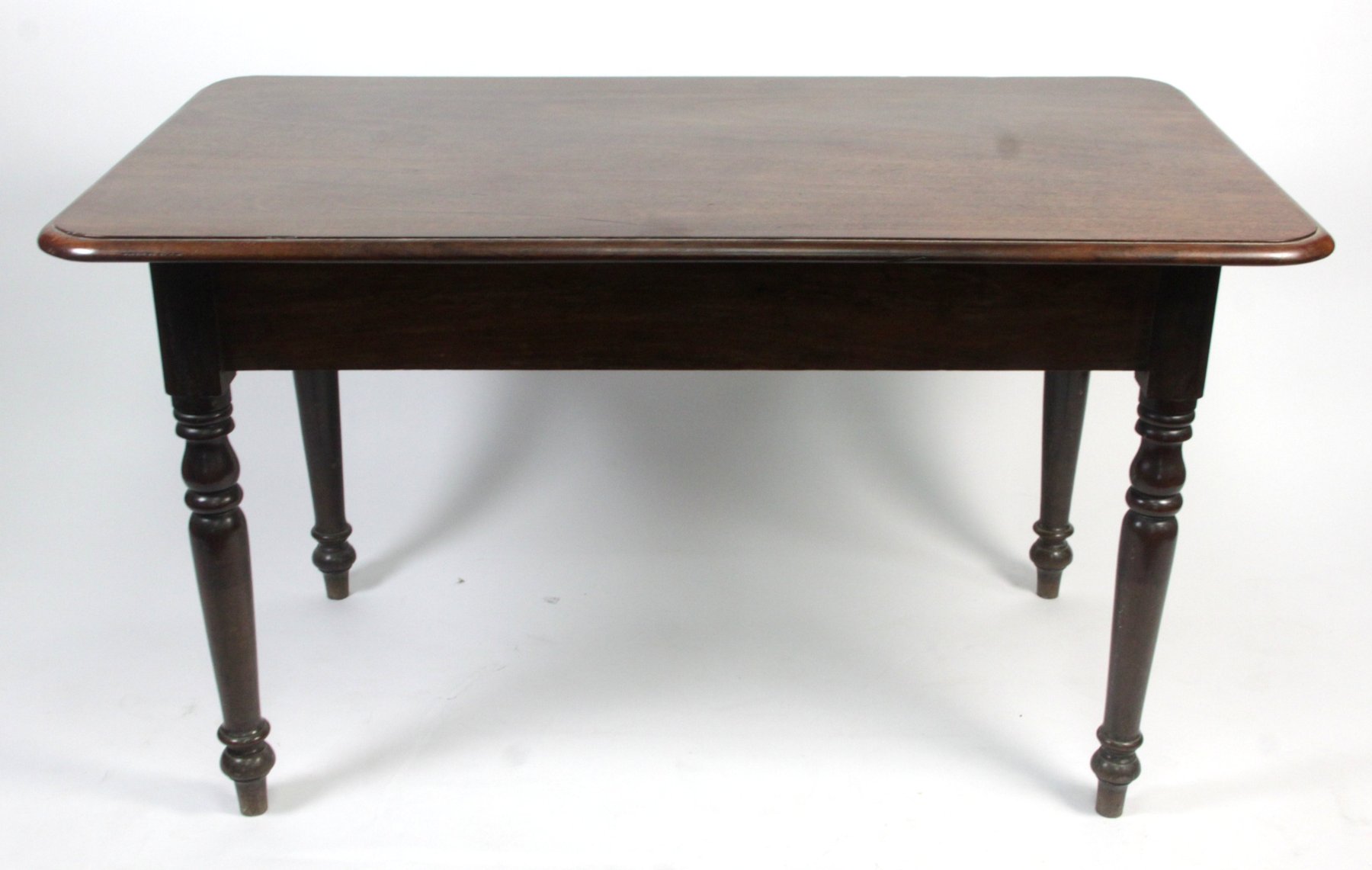 Appraisal: A Victorian mahogany kitchen table with end drawer and on