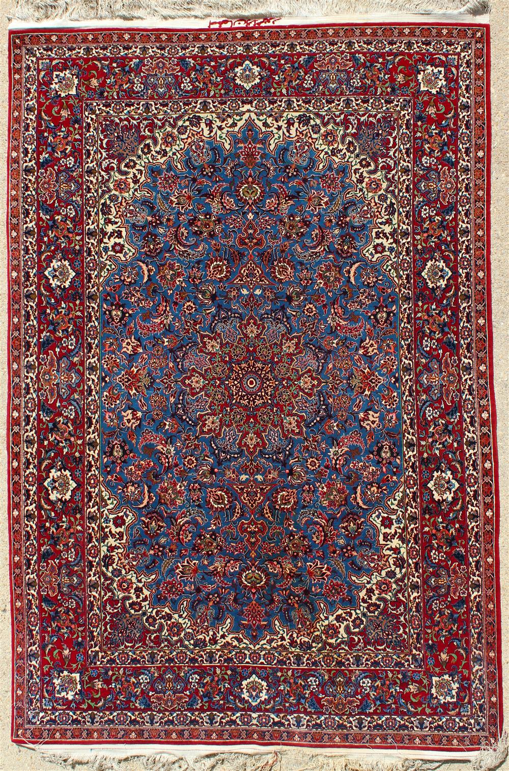 Appraisal: ISFAHAN MEDALLION RUG floral design on a blue ground with