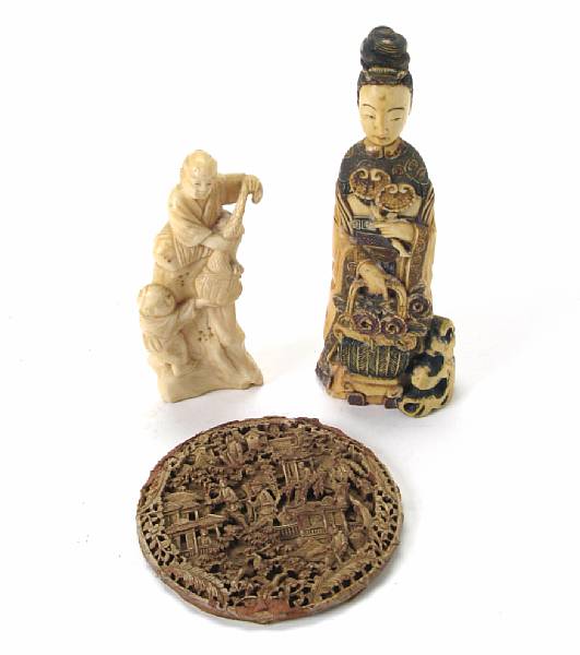 Appraisal: Two Chinese carved ivory figures and a carved wood roundel