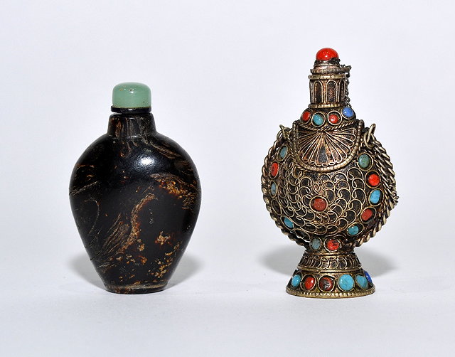 Appraisal: A Bhutanese copper snuff bottle th th Centuryflask shaped with