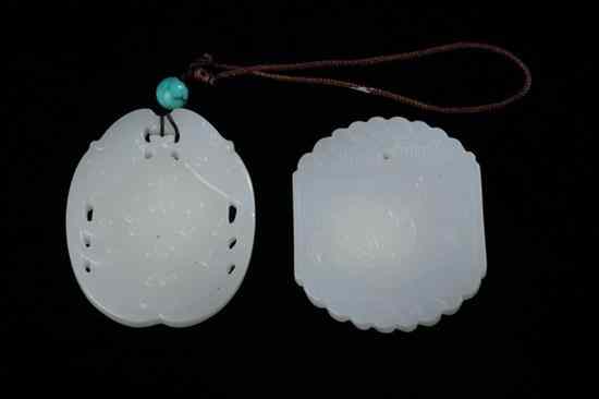 Appraisal: TWO CHINESE WHITE JADE PENDANTS Phoenix and peach decoration -