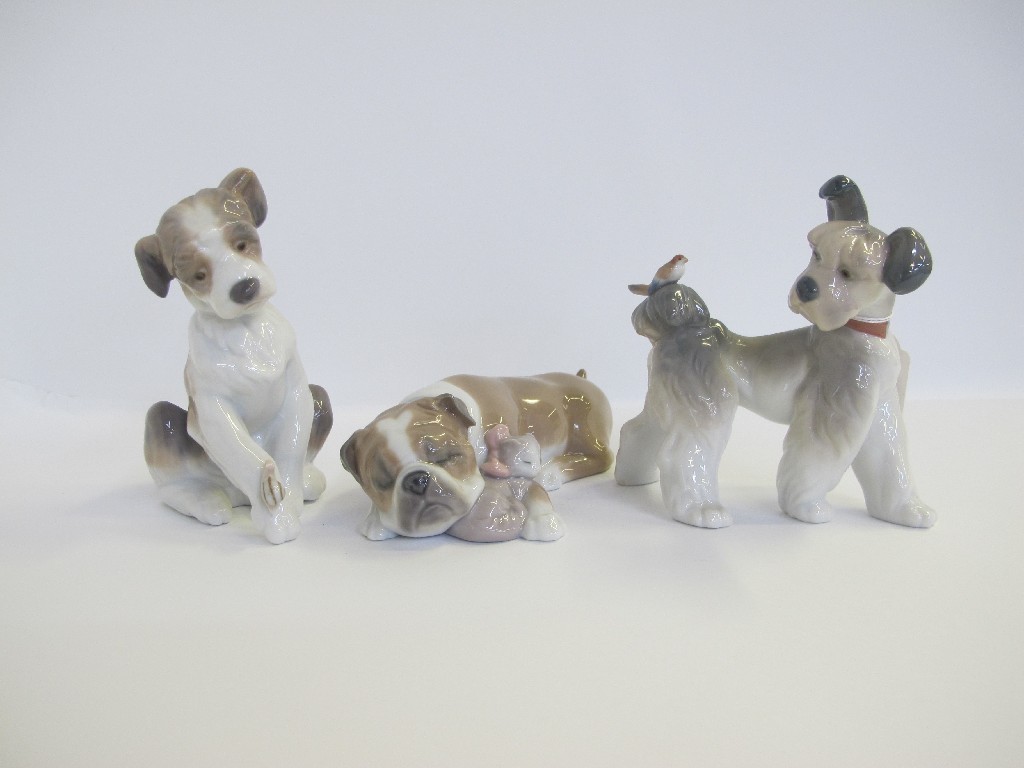 Appraisal: Three Lladro figures of dogs to include Unlikely Friends -