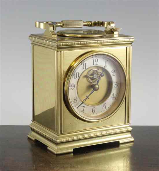 Appraisal: A late th century brass mantel time piece the top