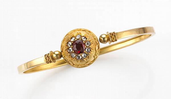 Appraisal: A ruby diamond k k and k gold bangle bracelet