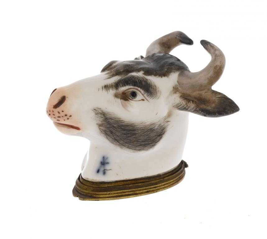 Appraisal: A FRENCH GILTMETAL MOUNTED SAMSON PORCELAIN BULL'S HEAD SNUFF BOX