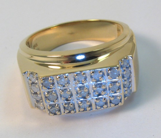 Appraisal: MAN'S DIAMOND AND TEN KARAT GOLD RING set with round-cut