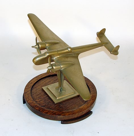 Appraisal: Solid brass model of a twin engine fighter bomber mounted