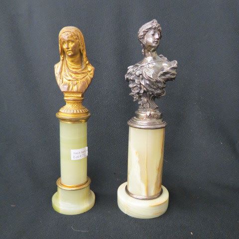 Appraisal: French Busts on Onyx Columns maidens one is silverplate other