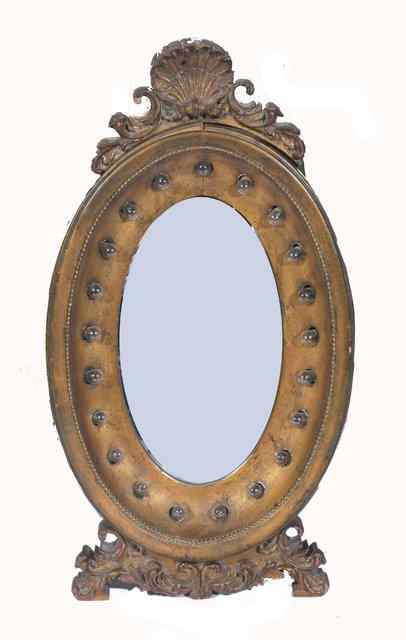 Appraisal: AN EARLY TH CENTURY OVAL GILT MIRROR with shell moulded