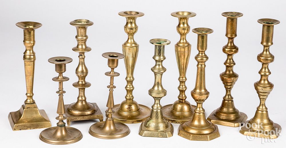 Appraisal: Ten brass candlesticks th th c Ten brass candlesticks th