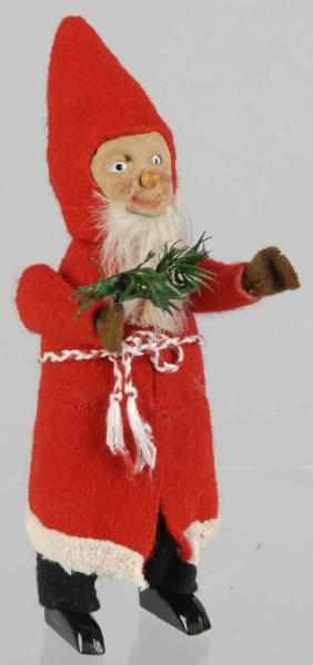 Appraisal: Schuco Father Christmas Gnome Wind-Up Toy Description Likely German When