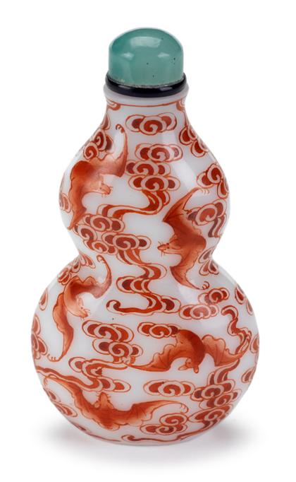 Appraisal: Chinese iron red decorated white glass snuff bottleqianlong mark late