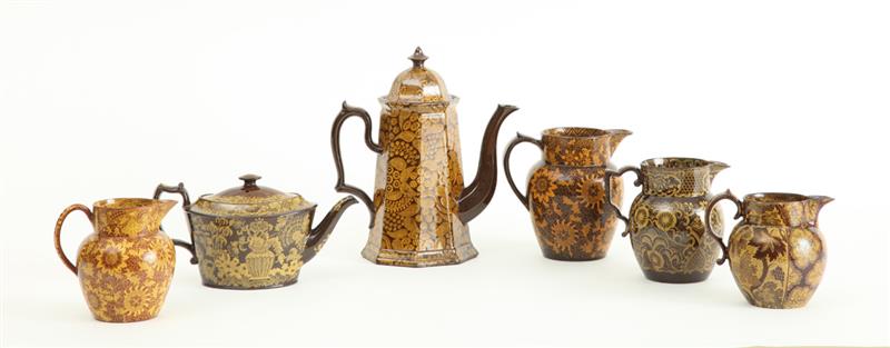 Appraisal: GROUP OF SIX STAFFORDSHIRE BROWN-GLAZED YELLOW TRANSFERWARE POTTERY ARTICLES Comprising