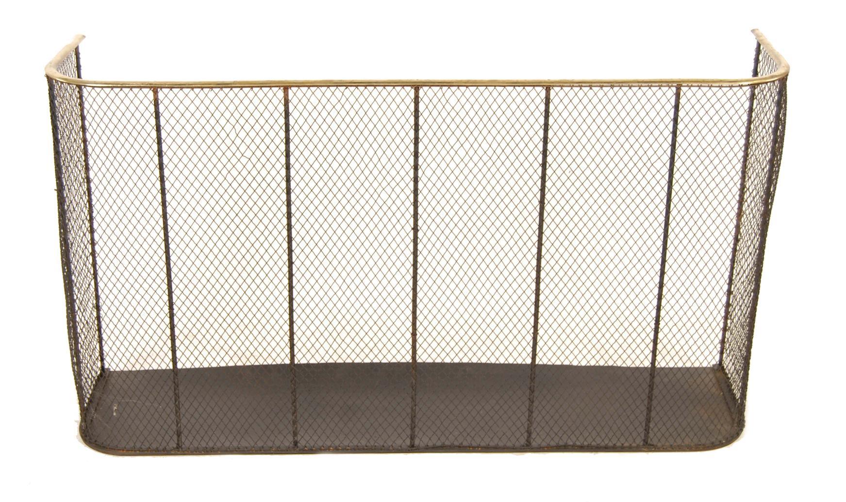 Appraisal: A brass and wirework nursery fender