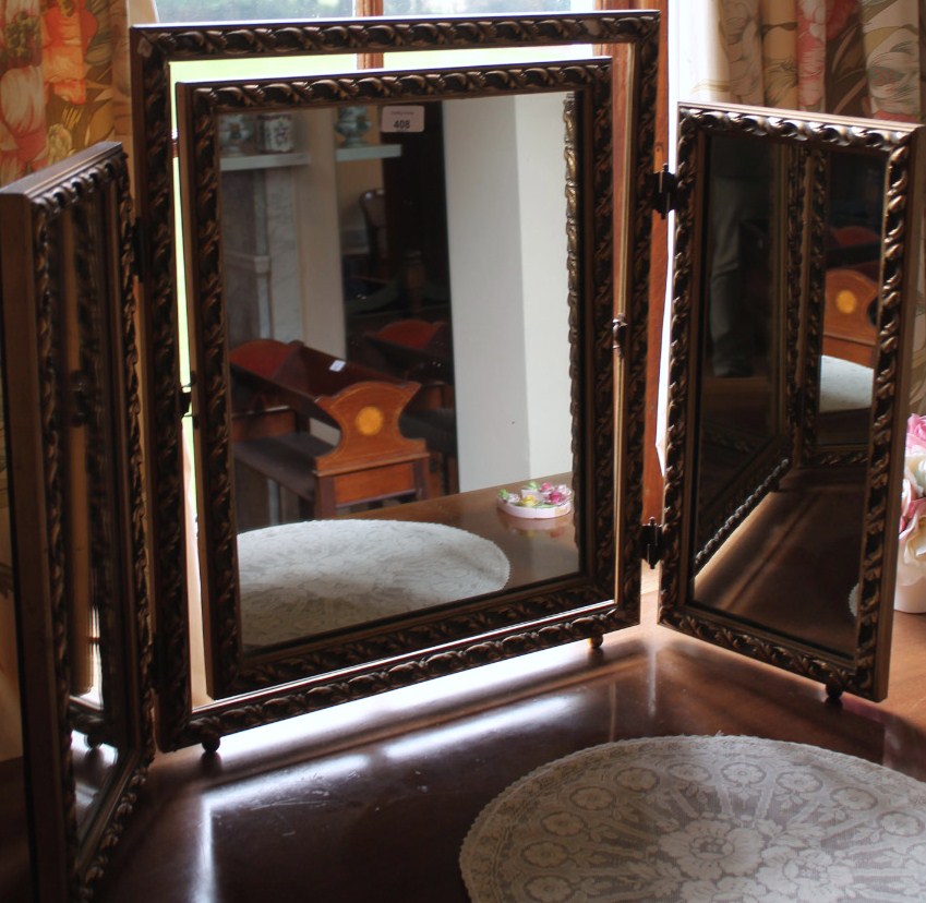 Appraisal: A gilt framed triple dressing table mirror