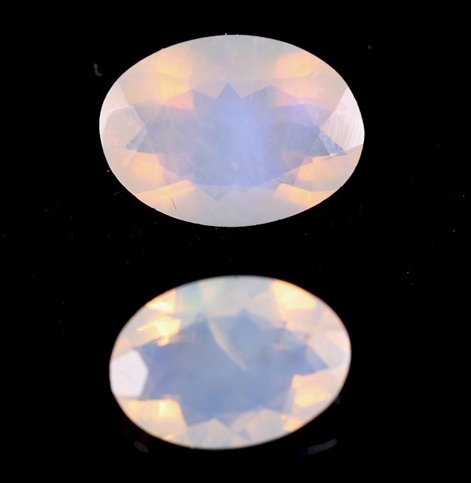 Appraisal: Oval Mixed-Cut Jelly Precious Fire Opal Gemstone For your consideration