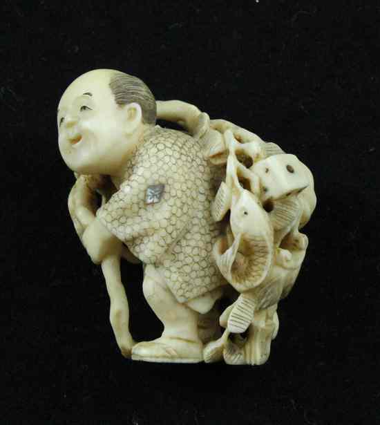 Appraisal: A Shibayama type ivory netsuke carved as a traveller bearing