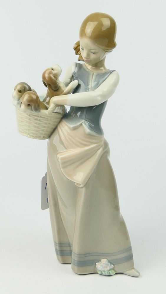 Appraisal: LLADRO GIRL WITH BASKET OF PUPPIES GLOSSY Condition All lots