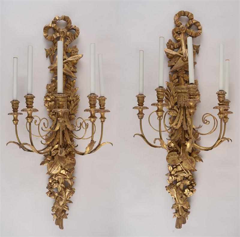 Appraisal: PAIR OF LOUIS XVI STYLE CARVED GILTWOOD FIVE-LIGHT WALL SCONCES