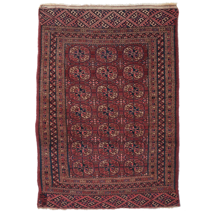 Appraisal: Turkoman rug c stylized floral design on a red field