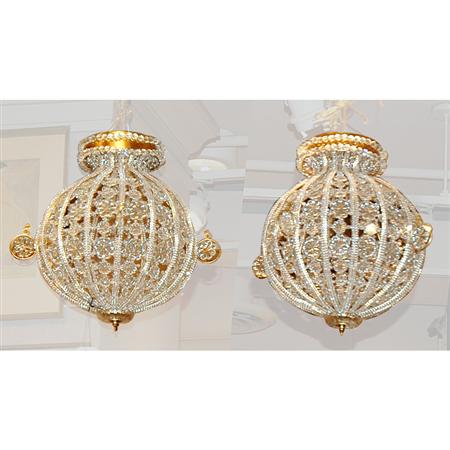 Appraisal: Pair of Molded and Beaded Glass Balloon-Form Three-Light Chandeliers Estimate