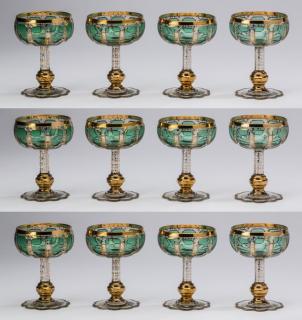 Appraisal: Moser emerald champagne glasses or dessert coups Moser champagne glasses