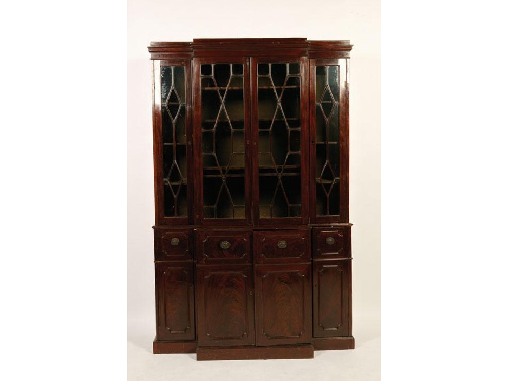 Appraisal: A GEORGE III STYLE MAHOGANY BREAKFRONT LIBRARY BOOKCASE of Hepplewhite